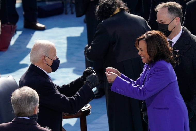 President-elect Joe Biden congratulates Vice President Kamala Harris after she was sworn in during the 59th Presidential Inauguration.