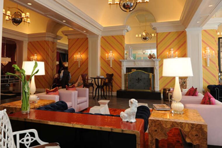 The lobby of the Hotel Monaco, which opened Thursday at Fifth and Chestnut Streets. APRIL SAUL / Staff Photographer