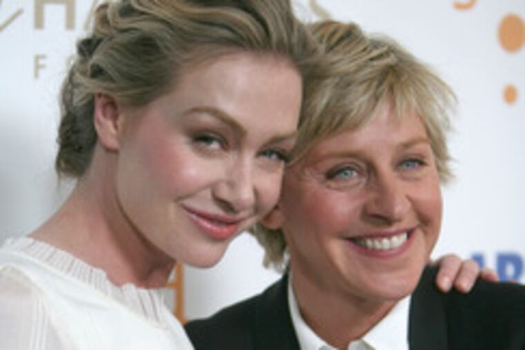 Portia de Rossi (left) and Ellen DeGeneres at their wedding. (See "Ellen decries Prop. 8.")