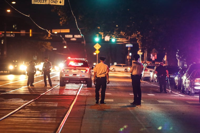 Police at 42nd Street and Girard Avenue where an 11-year-old boy was hit by a truck that fled the scene. Thursday, July 7, 2022