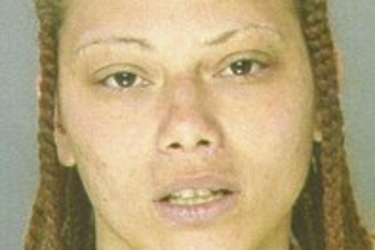 Nicole Wilson is accused in fatal beating.
