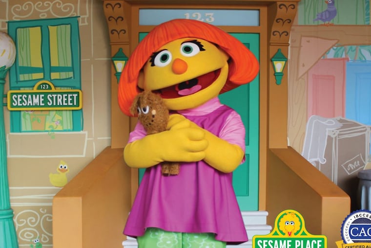 Julia, a Sesame Place character who has autism