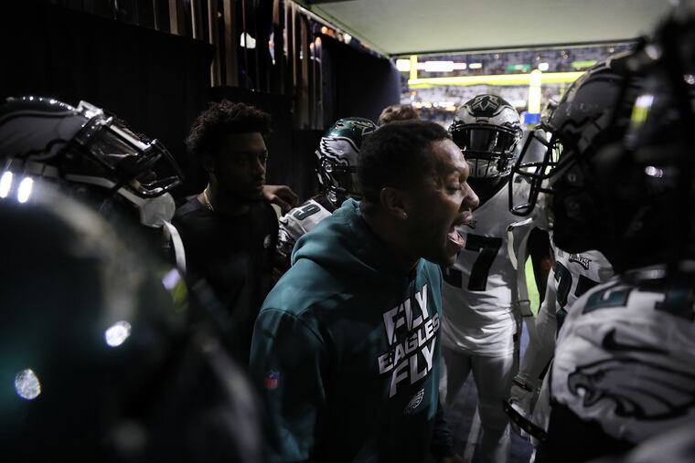 Injured safety Rodney McLeod trying to fire up members of the secondary before the Eagles played the Saints in the playoffs.