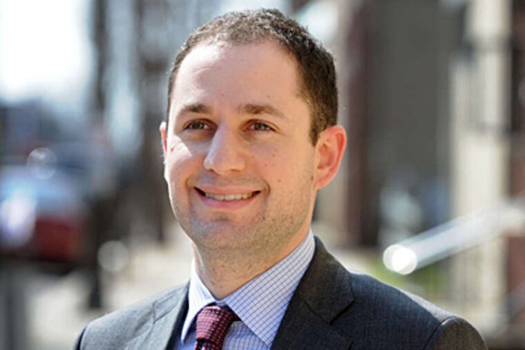 Real-estate developer Ori Feibush has become a lightning rod in Point Breeze, where he's built homes and wants to build a coffee shop and a pharmacy.