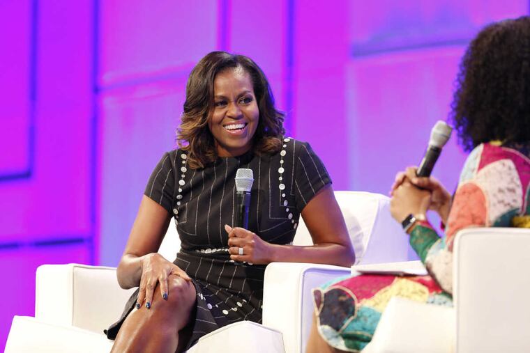 Former First Lady of the United States Michelle Obama and Screenwriter, director and producer Shonda Rhimes speak on stage during Pennsylvania Conference For Women 2017 at Pennsylvania Convention Center on Oct. 3, 2017 in Philadelphia, Pennsylvania.