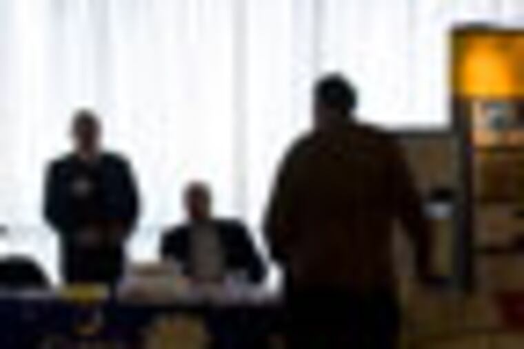 People visit booths for information, campaigning and souvenirs at the South Carolina Tea Party Convention 2012 at Springmaid Beach Resort in Myrtle Beach, S.C., on Sunday, Jan. 15, 2012. Speakers for Monday's event includes Gov. Nikki Haley at 9:10 a.m.; state superintendent of education Mick Zais at 1:30 p.m.; Republican presidential candidates Rick Santorium at 3:05 p.m.; Newt Gingrich at 3:25 p.m.; and Ron Paul at 3:45 p.m. (AP Photo/The Sun News, Janet Blackmon Morgan)