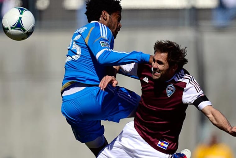 Colorado Rapids' Brian Mullan (11) and Philadelphia Union's Sheanon
Williams (25) collide as they battle for a high ball during the first half of a MLS soccer game at Dick's Sporting Goods Park. Saturday, March 10, 2013, in Commerce City, Colo. (AAron Ontiveroz/AP, The Denver Post)