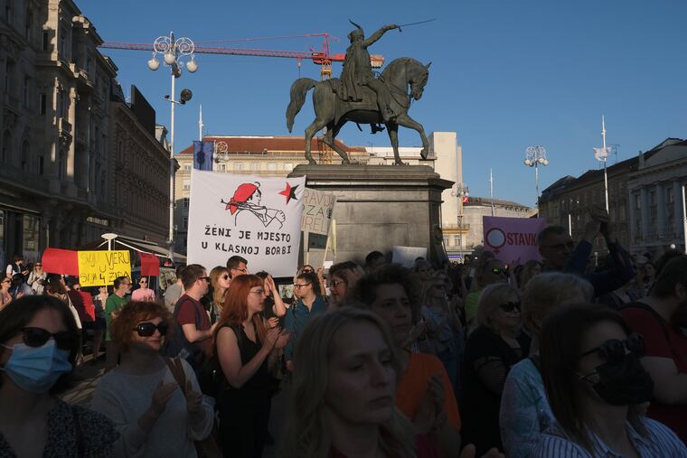 People attend a protest in solidarity with a woman who was denied an abortion despite her fetus having serious health problems, in Zagreb, Croatia, in 2022. In staunchly Catholic Croatia, influential conservative and religious groups have tried to get abortion banned but with no success. However, many doctors refuse to terminate pregnancies, forcing Croatian women to travel to neighboring countries for the procedure.