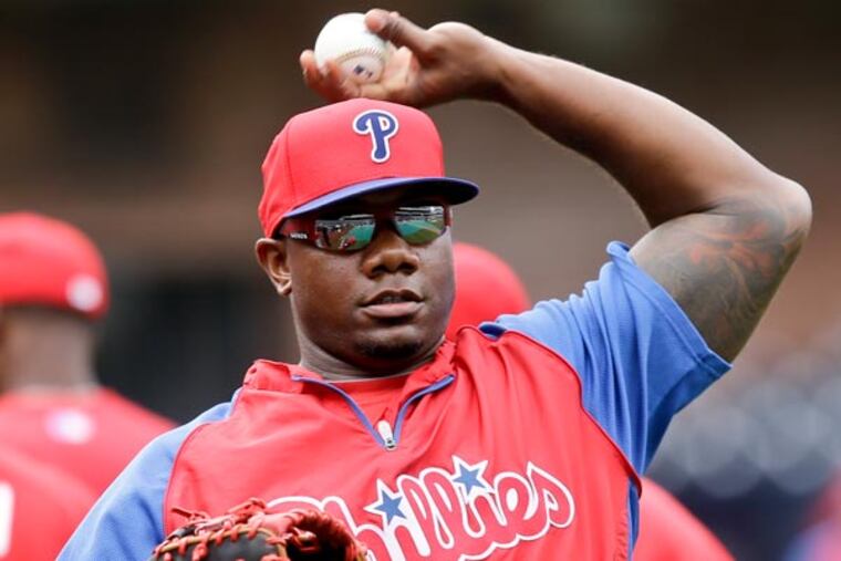 Ryan Howard gets ready for a baseball game against the San Diego Padres during warmups in San Diego, Monday, June 24, 2013. (Lenny Ignelzi/AP)