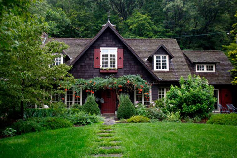 The 3,000-square-foot frame house that was built about 1920 on an estate, housing four carriages and a gardener.