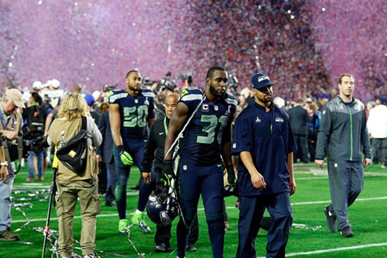 Seattle Seahawks strong safety Kam Chancellor (31) walks off the field after Super Bowl XLIX. (Matthew Emmons/USA Today)