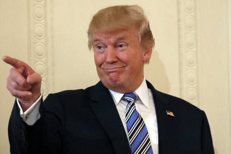 President Donald Trump points to a member of the audience before being introduced during a "Made in America," product showcase featuring items created in each of the U.S. 50 states, at the White House, Monday, July 17, 2017, in Washington. (AP Photo/Alex Brandon)