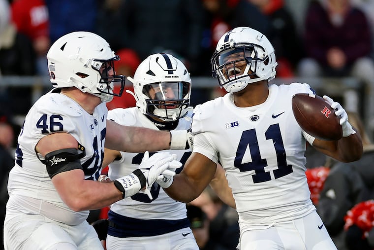 Penn State linebacker Kobe King (41) reacts to scoring a touchdown after recovering a Rutgers fumble in the first half.