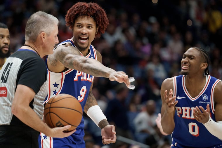 The Sixers' Kelly Oubre Jr. (9) and Tyrese Maxey (0) argue a call during their loss to the Pelicans on Saturday in New Orleans.