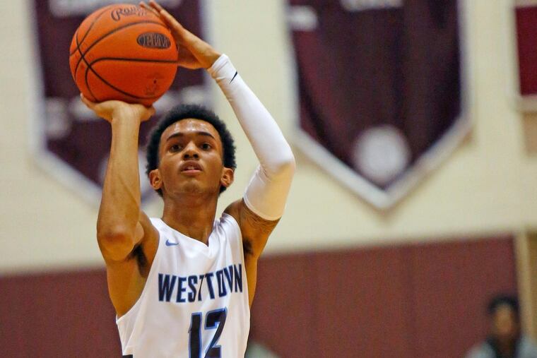 Westtown’s Jalen Gaffney shoots over Camden’s Corey Greer in the second quarter during the Kobe Bryant Boosters Philly.com Play-By-Play Classic on Saturday, Jan. 20, 2018, at Lower Merion. Camden went on to win, 74-71, in overtime. LOU RABITO / Staff