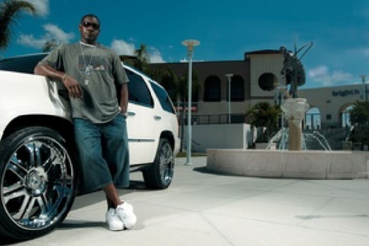 Phillies slugger Ryan Howard has a ticket to ride this 2007 Escalade, featured in a car magazine.