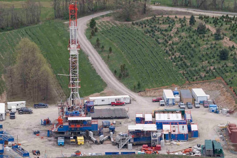 Natural gas drilling operations, such as this one in Chartiers Township, Washington County, have proliferated in the Marcellus Shale formation in Pennsylvania. Gov. Corbett wants to expand them to state forests, prisons, and colleges.