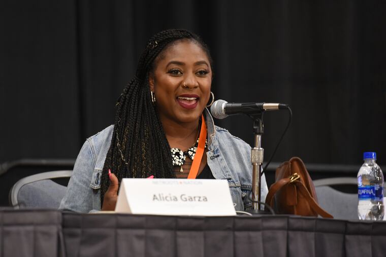 Alicia Garza, speaks on the panel during the Women Marched, Ran and Won: What's Next talk at Netroots Nation Conference in the Convention Center in Center City, Philadelphia on Thursday, July 11, 2019.