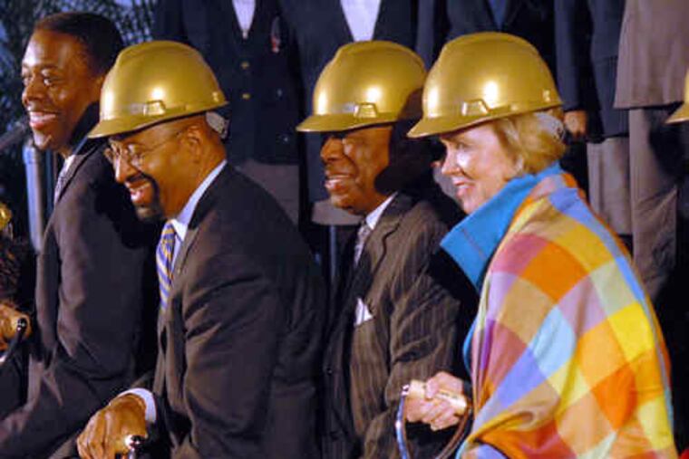 At top, a rendering of the museum. Above, at the groundbreaking are (from left) Councilman Darrell Clarke; Mayor Nutter; Bernard C. Watson, of the Barnes Foundation; and Judge Marjorie Rendell.