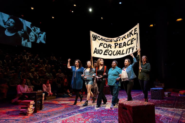 Mary McDonnell (center, in pant suit) and the company of Emily Mann's "Gloria: A Life" at McCarter Theatre Center.