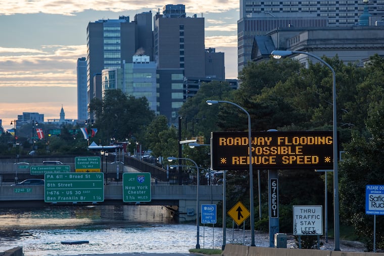 Sign informs motorists that there could be flooding on the Vine Street Expressway after heavy rain from Hurricane Ida in September 2021.