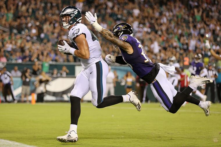 Alex Ellis (left) caught a touchdown pass in the Eagles' preseason game against the Baltimore Ravens at Lincoln Financial Field.
