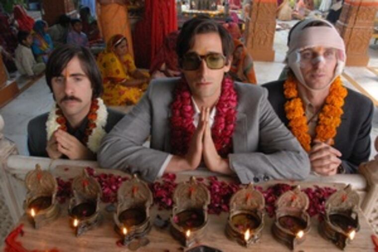 Estranged brothers (from left) Jason Schwartzman, Adrien Brody and Owen Wilson ride "The Darjeeling Express."