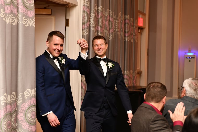 Greg (left) and Sean entering the reception.