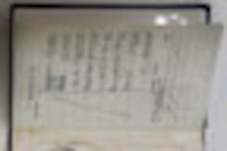 Fake passports that were used in the operation to capture Nazi SS officer Adolf Eichmann, one displaying Eichmann's image, right, are displayed in an exhibition about Eichmann's capture, in the Knesset, Israel's parliament, in Jerusalem, Monday, Dec. 12, 2011. Fifty years Eichmann was convicted in an epic trial that helped shape Israel's national psyche, the Israeli parliament on Monday displayed dozens of never-seen-before artifacts from the daring 1960 operation in Argentina that captured the Nazi criminal. The forged Israeli passport with the alias Zeev Zichroni was used to smuggle Eichmann out of Argentina. (AP Photo/Sebastian Scheiner)