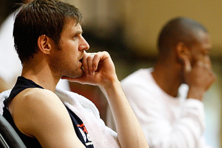 Andres Nocioni watches during Sixers Training Camp at St. Joseph's University. (David Maialetti / Staff Photographer)