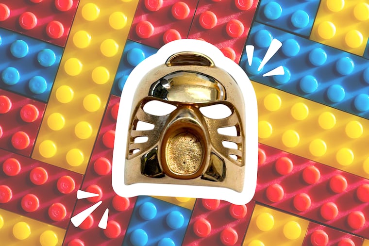 A rare 14-karat gold Bionicle Golden Kanohi Hau Mask Lego piece was found at a Pennsylvania Goodwill warehouse. The piece is up for auction with bids in the thousands.
