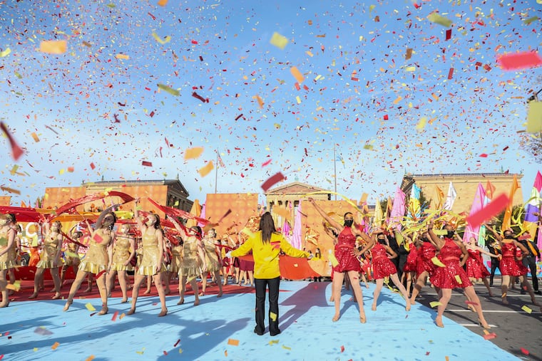 Confetti flies through the air during the opening number of Philadelphia's 2021 Thanksgiving Day Parade. Started by Gimbels in 1920, the city's Thanksgiving Day parade is thought to be the oldest in the nation.