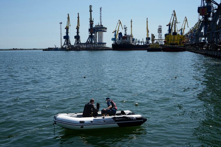 Servicemen of Donetsk People's Republic Emergency Ministry worked to defuse a Ukrainian mine in an area of the Mariupol Sea Port on April 29.