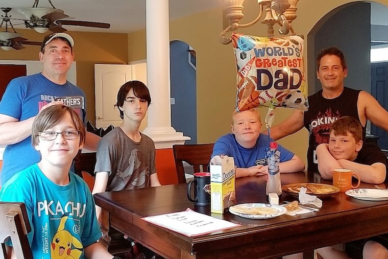 The Guyon Lugo family (left to right), Jimmy, Jim, Michael, Brandon, John and José, in this 2017 file photo. The family receives federal adoption subsidies to help with expenses.