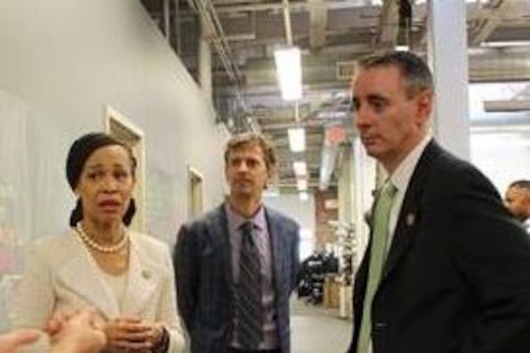 U.S. Rep. Lisa Blunt Rochester; Evan Malone, president of NextFab; and U.S. Rep. Brian Fitzpatrick at NextFab's main South Philly location last fall.