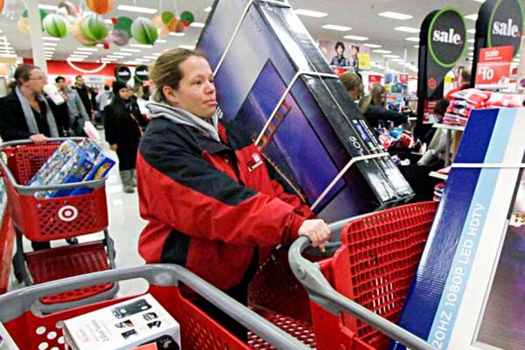 Getting around and then checking out of the Deptford Target store just after their 8pm opening was difficult on November 28, 2013. ( ELIZABETH ROBERTSON / Staff Photographer )