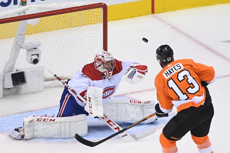 Canadiens goaltender Carey Price (31) makes a glove save on Flyers center Kevin Hayes (13) during Montreal's 5-3 victory Wednesday night.
