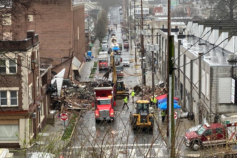 Emergency responders at the site of a deadly explosion at a chocolate factory in West Reading, Pa., on March 25.