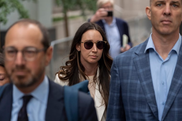 Charlie Javice, center, exits Manhattan federal court, Monday, Sept. 29, 2025, in New York.