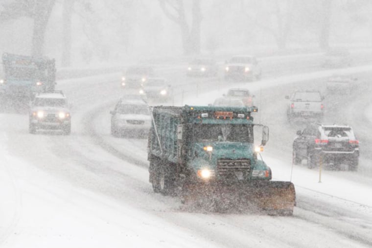 A snow plow train clears snow from Rt. 1 near Longwood on Tuesday, January 21, 2014. ( MICHAEL S. WIRTZ / Staff Photographer )