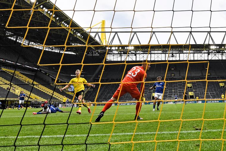 Borussia Dortmund's Erling Haaland scored the Bundesliga's first goal since the end of the league's coronavirus-enforced hiatus. The 19-year-old celebrated with a restrained dance while his teammates stayed well away.