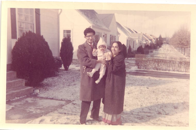 The author at about 15 months with her father and mother in February 1963.