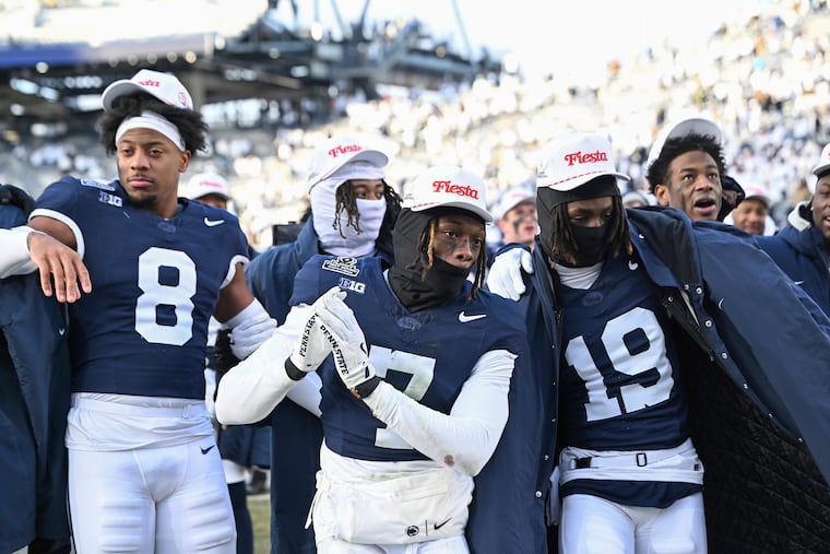 Penn State players celebrate after their win over SMU in the first round of the College Football Playoff on Saturday.