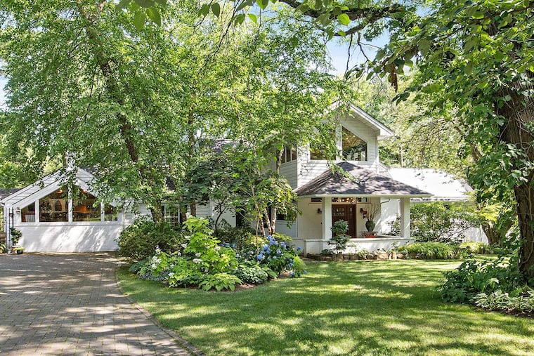 Renovations included the addition, which became a greenhouse with a glass wall separating it from a conservatory, as well as a brand new kitchen, refurbished dining room and a new four-stall garage with room for a tractor and golf cart.