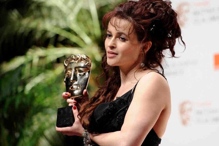 Helena Bonham Carter (best supporting actress) and Colin Firth (best actor) won for "The King's Speech."