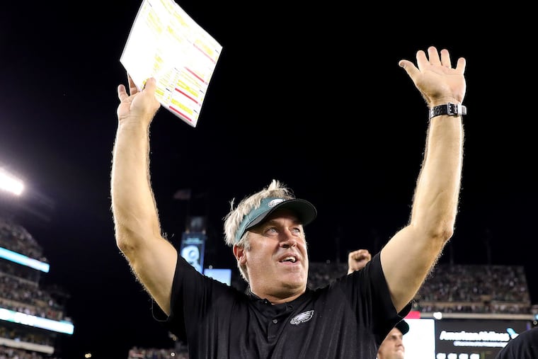 Eagles' head coach Doug Pederson celebrates after the Philadelphia Eagles win 18-12 over the Atlanta Falcons in Philadelphia, PA on September 6, 2018. DAVID MAIALETTI / Staff Photographer