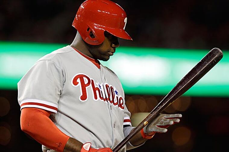 For the second straight Sunday, Ryan Howard could not start at first base because of his knee. (Alex Brandon/AP)