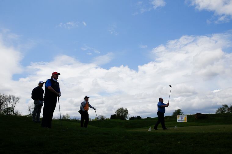 A foursome starts their round of golf at the Golf Course at Glen Mills on Friday, May 1. Pennsylvania and New Jersey have allowed golf courses to reopen.