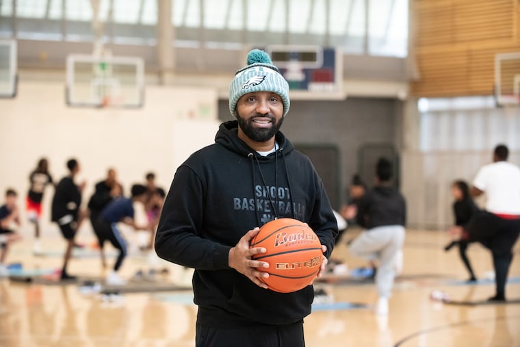 Garry Mills, the head of Shoot Basketballs NOT People, at a free program run by his organization at Germantown Friends School.