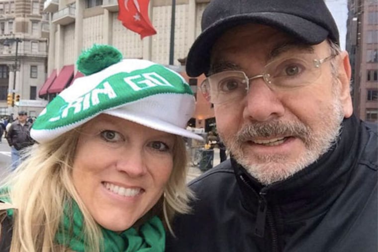 That's Diamond (Neil) celebrating the Emerald Isle at Philly's St. Patrick's Day Parade with the appropriately dressed and named Katie McNeil, also known as Mrs. Diamond, both in town for his concert here Sunday night.